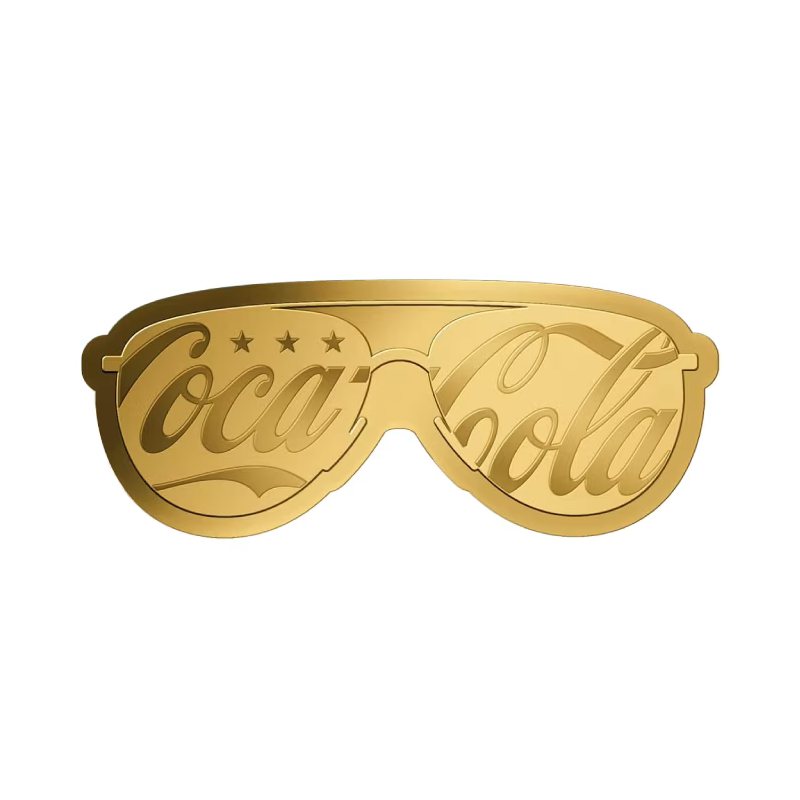 Золотий злиток у картці Coca-Cola «Ведмедик в окулярах», 1/1000 унції — лицьова сторона злитка Золотий злиток у картці Coca-Cola «Ведмедик в окулярах», 1/1000 унції — лицьова сторона злитка